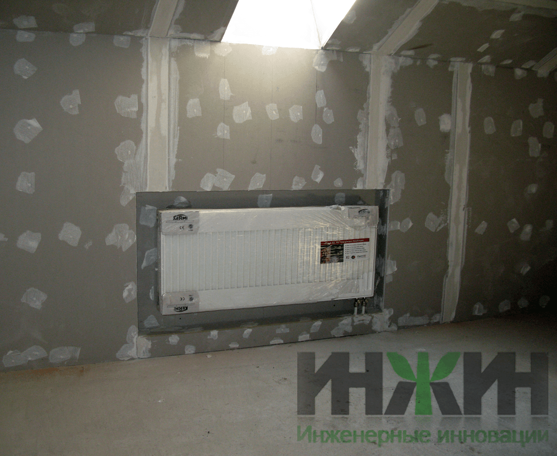 Радиатор отопления Kermi на стене из гипсокартон