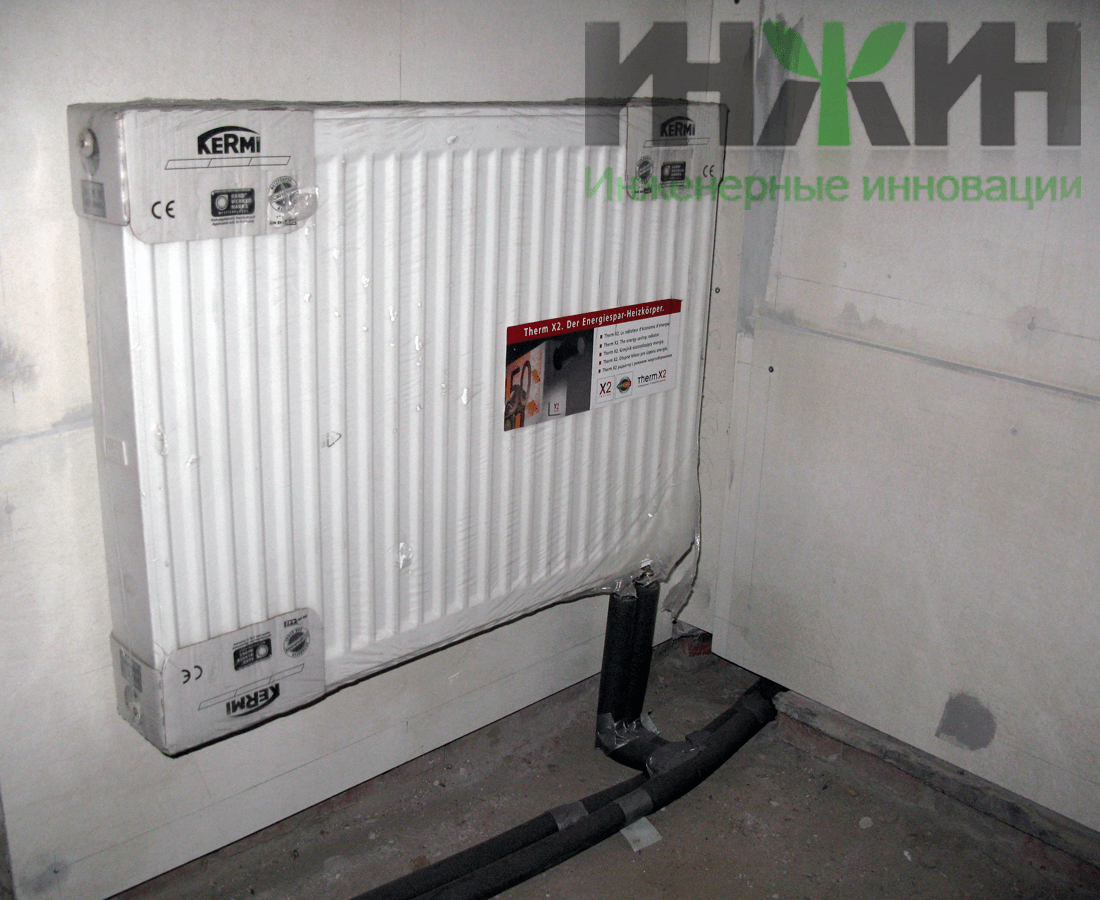 Система отопления частного дома, монтаж радиатора на стене