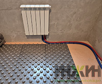 Монтаж радиатора отопления RIFAR на кухне частного дома в КП "Березовый парк 4"