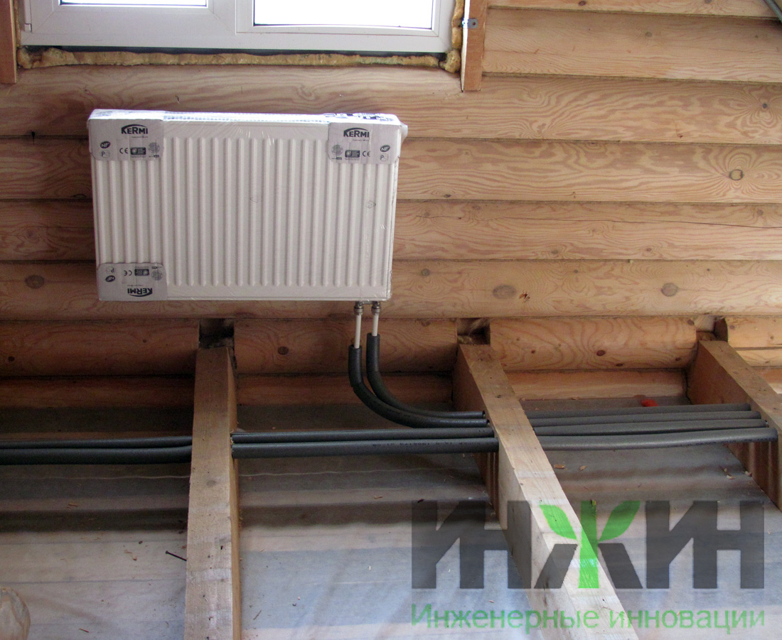 Отопление в деревянном доме, монтаж радиатора