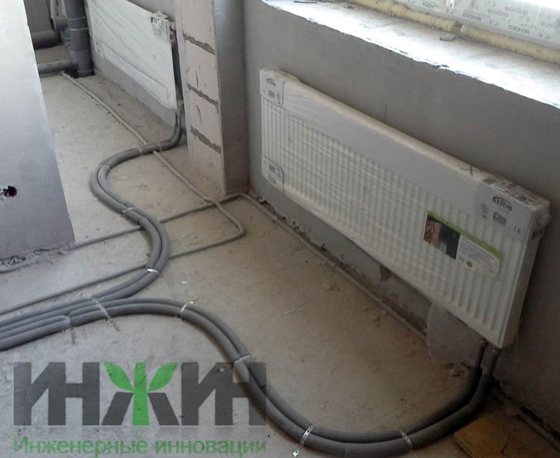 Монтаж отопления в частном доме, трубы и радиаторы отопления Kermi 