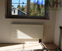 Монтаж панельного радиатора отопления в доме в КП "Кстининское Озеро"