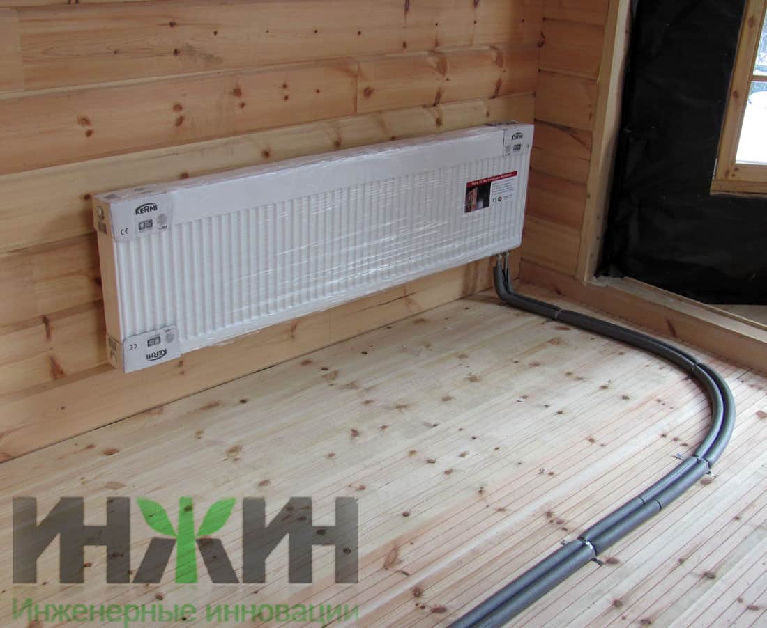 Отопление в частном деревянном доме, монтаж радиатора Kermi