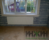 Монтаж радиаторов отопления Kermi под окнами дома в СНТ "Мельник"