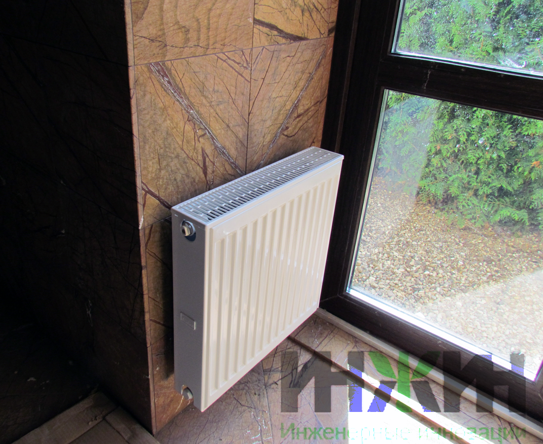 Радиатор отопления, монтаж на стене
