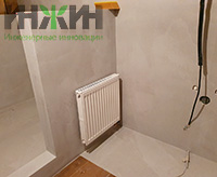 Монтаж радиатора KERMI на стене санузла дома в КП "Новорижский Эдем"