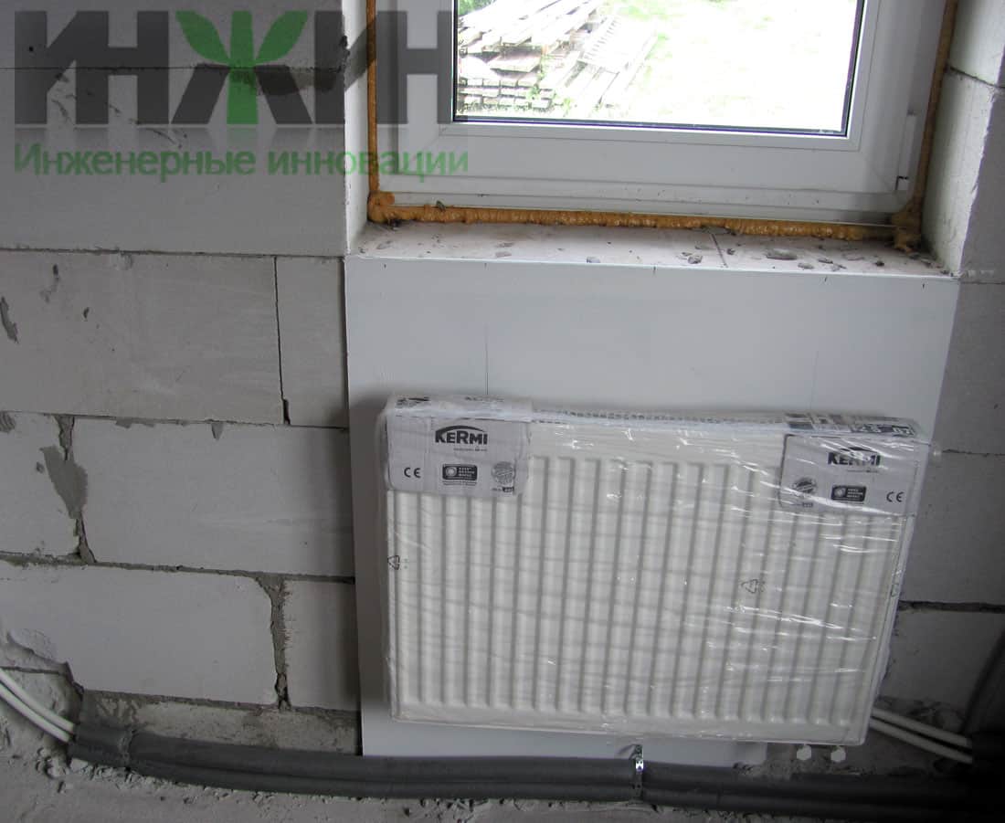Монтаж стального панельного радиатора отопления Kermi в доме