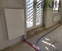 Монтаж радиатора отопления в доме из газоблоков в КП "Павловы Озера"