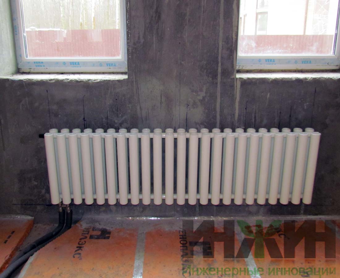Монтаж радиатора отопления Гармония под окном в частном доме
