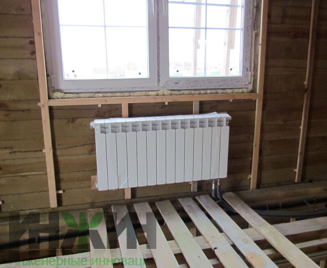 Отопление деревянного дома, монтаж радиатора Rifar