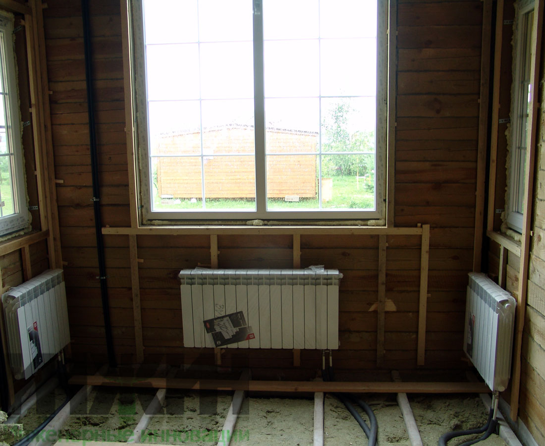 Отопление деревянного дома, монтаж радиаторов Rifar