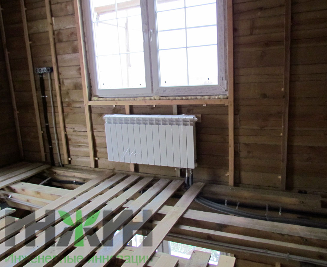 Отопление деревянного дома, монтаж биметаллического радиатора