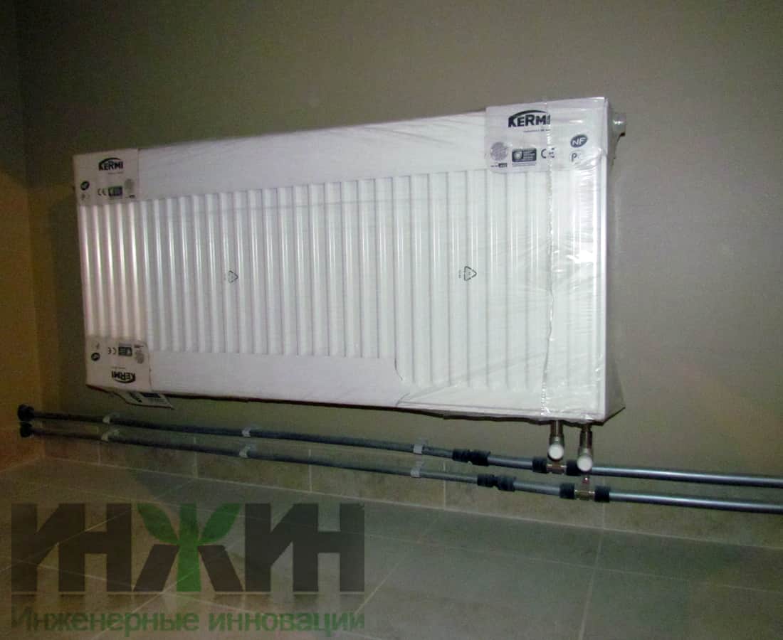 Панельный радиатор отопления Kermi, установка в двухтрубной системе отопления частного дома