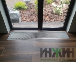 Монтаж конвекторов отопления Varmann под витражным окном