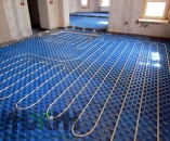 Монтаж водяного теплого пола на первом этаже дома в КП 