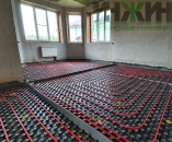 Теплы пол в гостиной частного дома